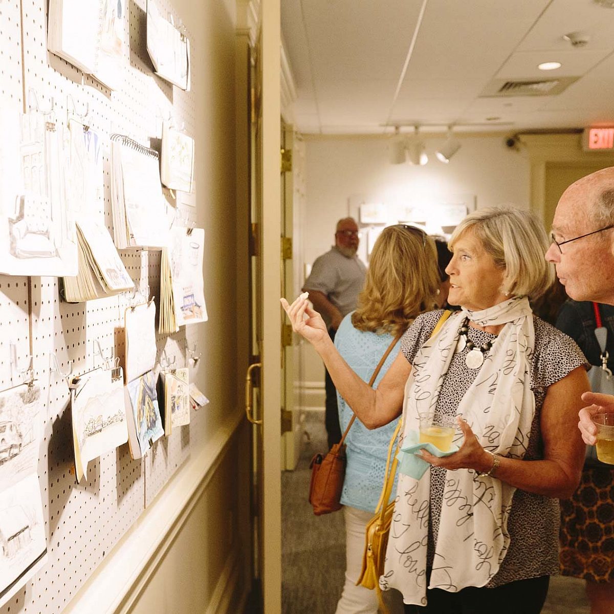 People Looking at Art at a Dixon Exhibition