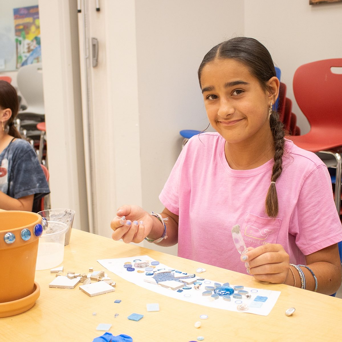 Youth workshop-girls-two girls-flower pots-smile
