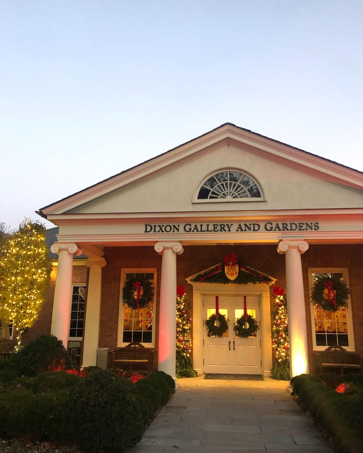 Front of the museum with Christmas wreaths on doors and windows
