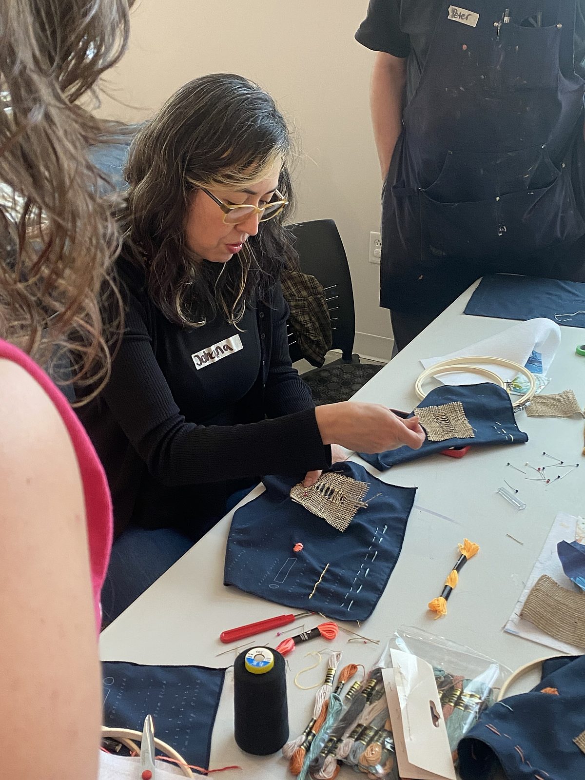 Workshop participant learning how to embrioder