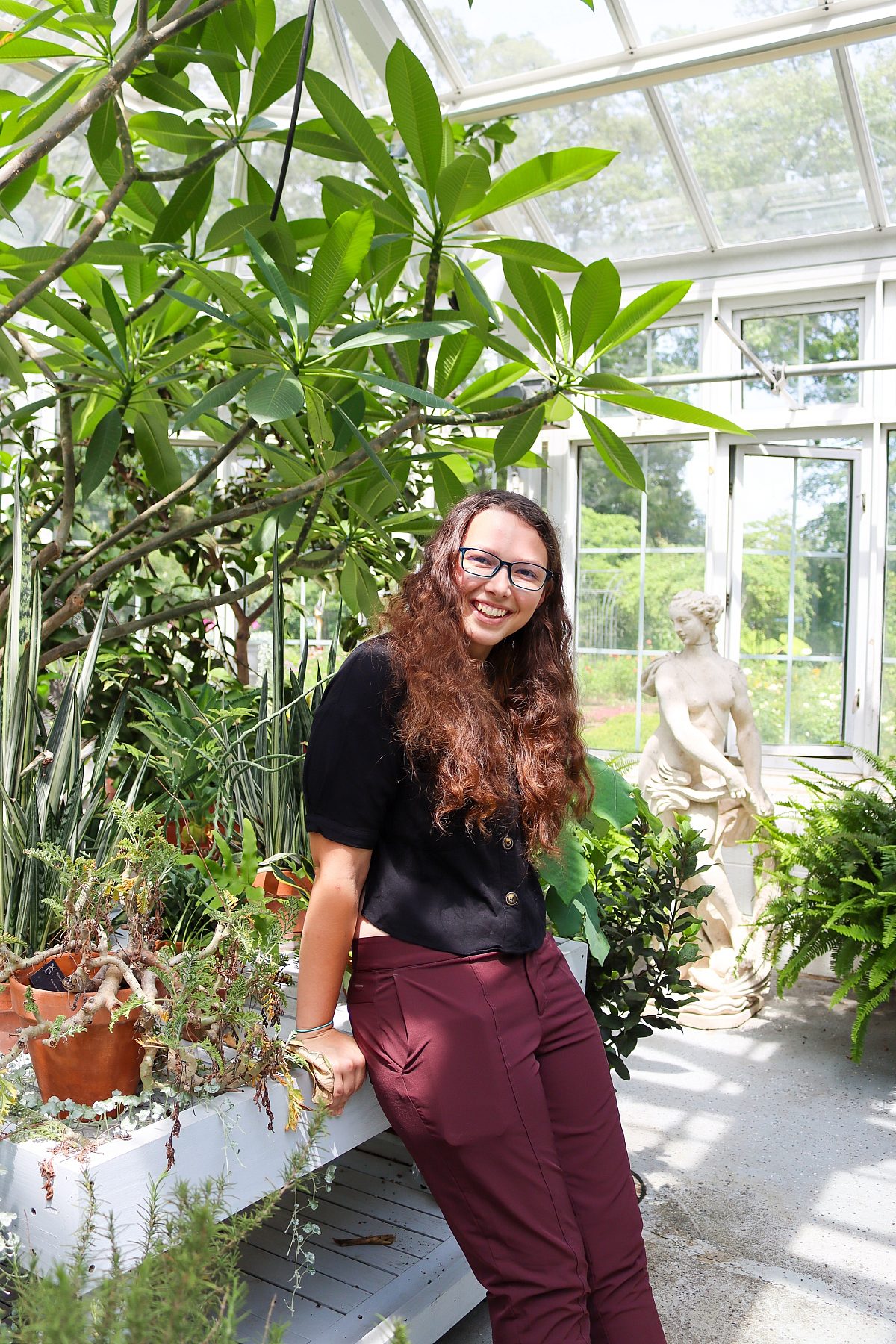 intern-woman-headshot-garden