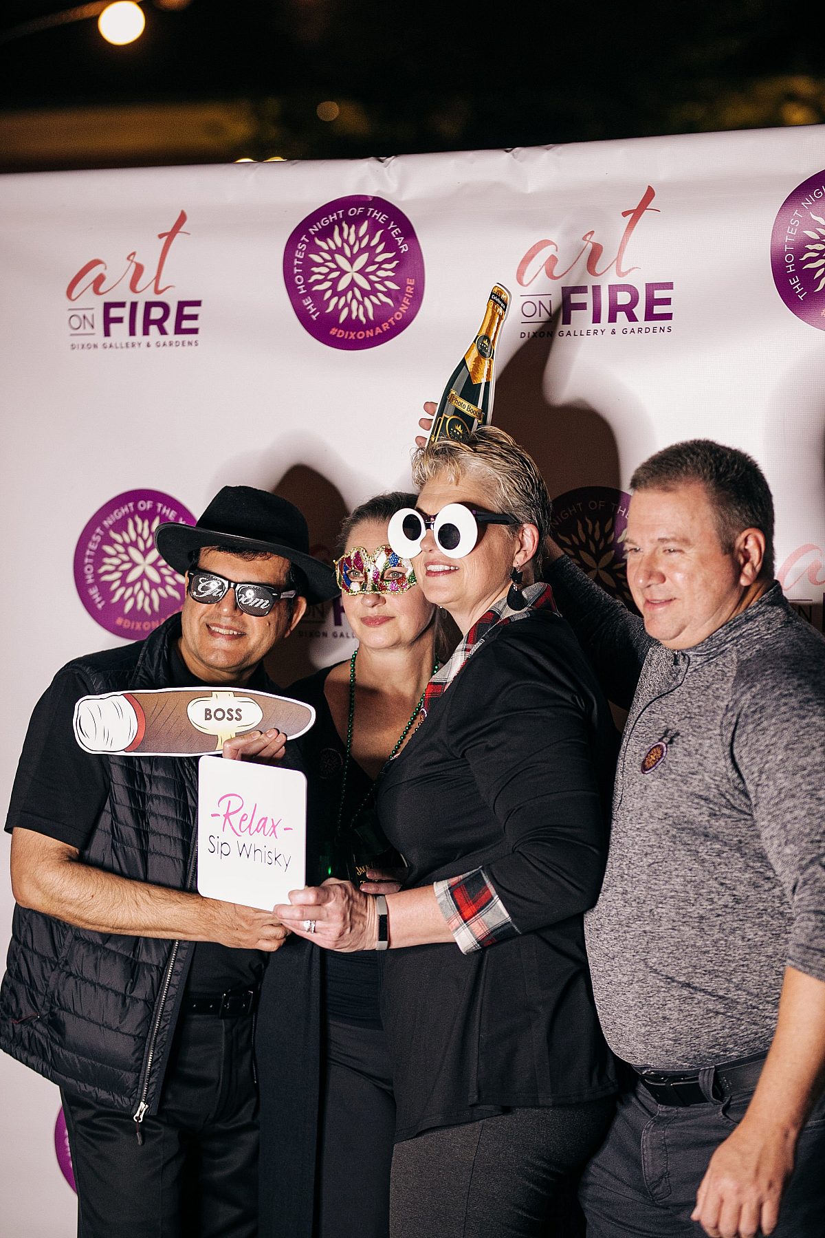 Art on Fire Guests taking photos in the photo booth