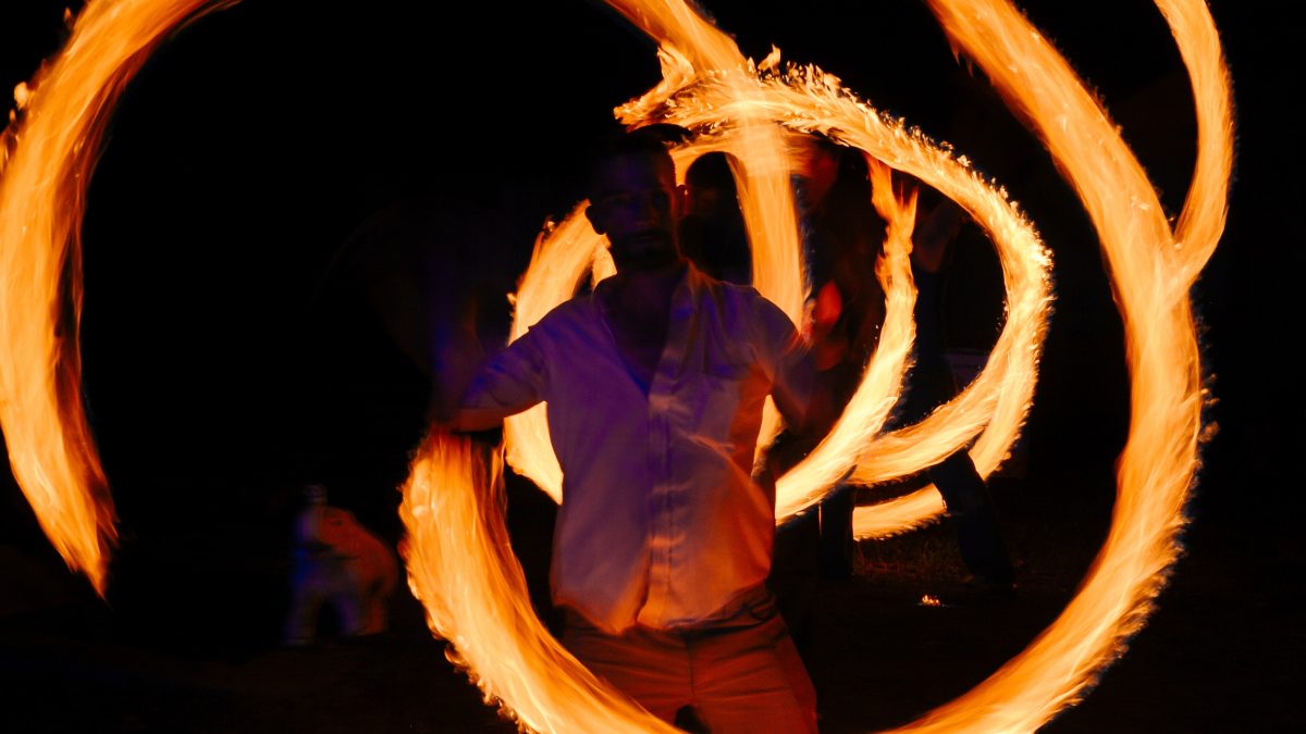 Art on fire entertainer spinning fire