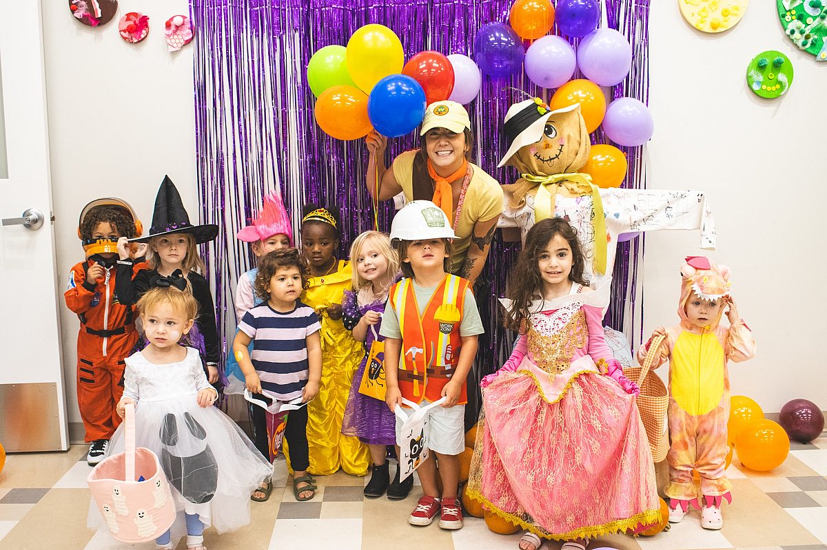 Multiple children dressed up in halloween costume