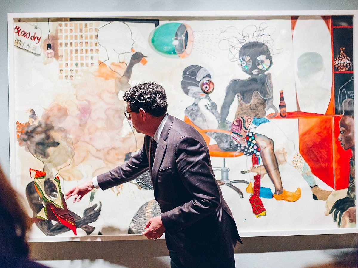 Kevin pointing at art