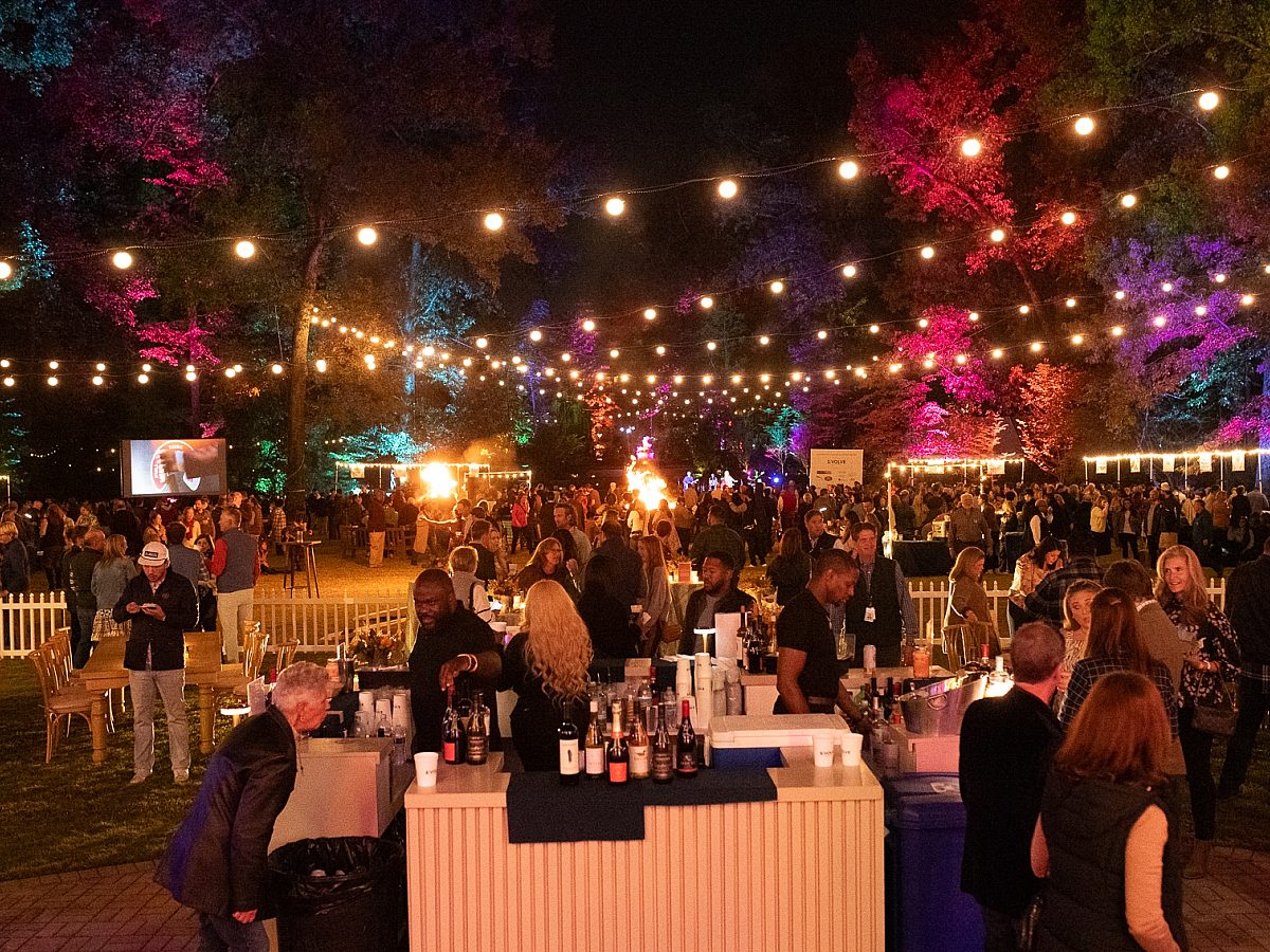 people enjoying food and drinks at art on fire