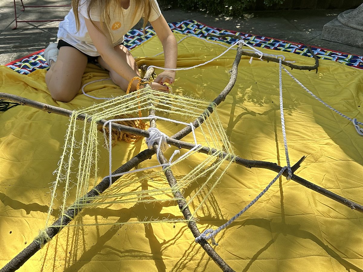 Child playing with pop activity during fall break bonanza