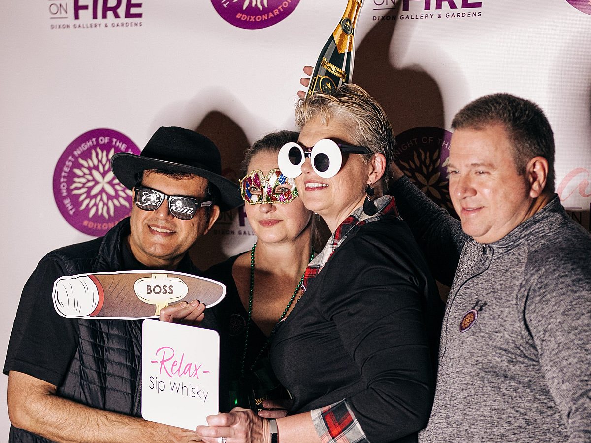 Art on Fire Guests taking photos in the photo booth