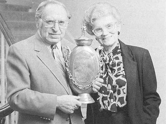 “Dr. and Mrs. Justin H. Adler with a Large Gustav Adolf Commemorative Vessel from their collection,” Newsletter, Dixon Gallery and Gardens (January-March 1990).