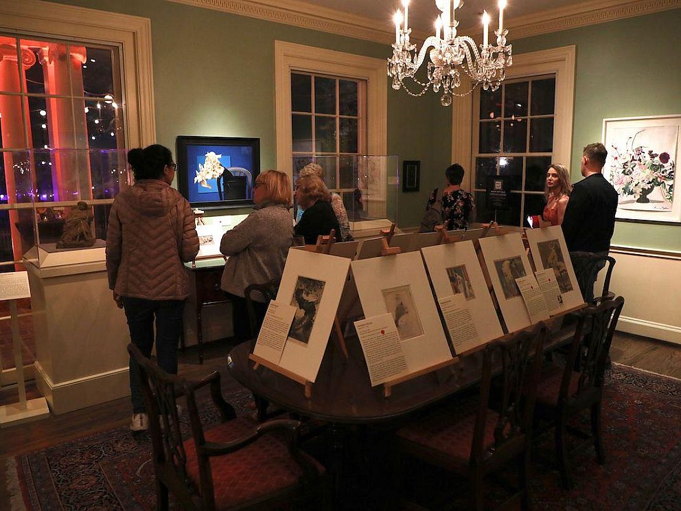 people having fun looking at art